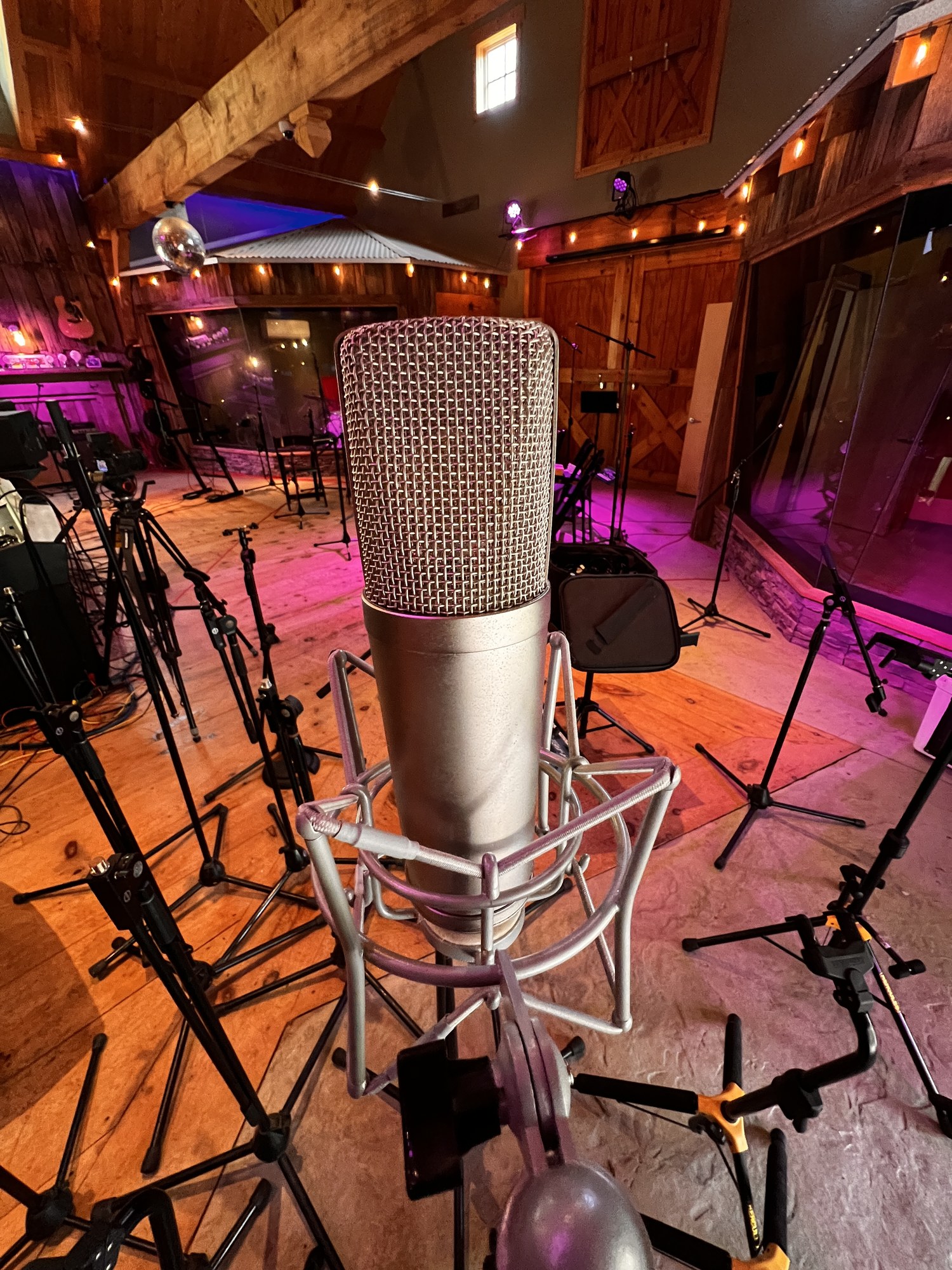 A microphone in a Krush Audio recording environment